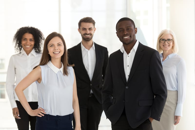 A diverse team of happy real estate agents